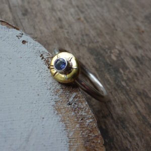 Silver and Brass Sun Pebble Ring with Blue Stone